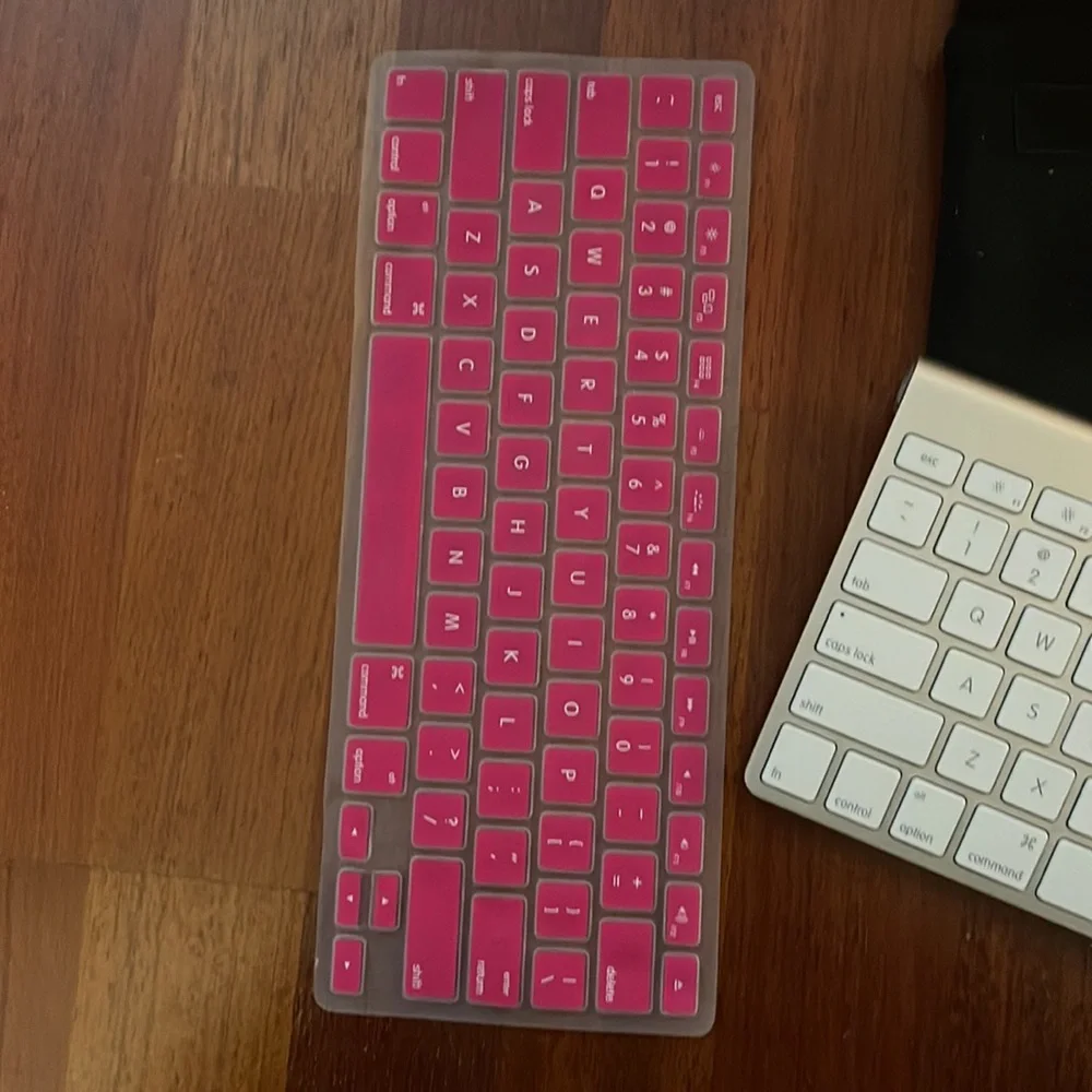 Apple wireless keyboard, case and dust cover for keyboard. Used for grad school.